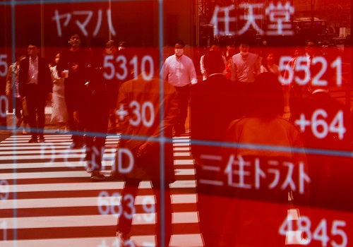 Japan shares hit three-decade high, yuan climbs
